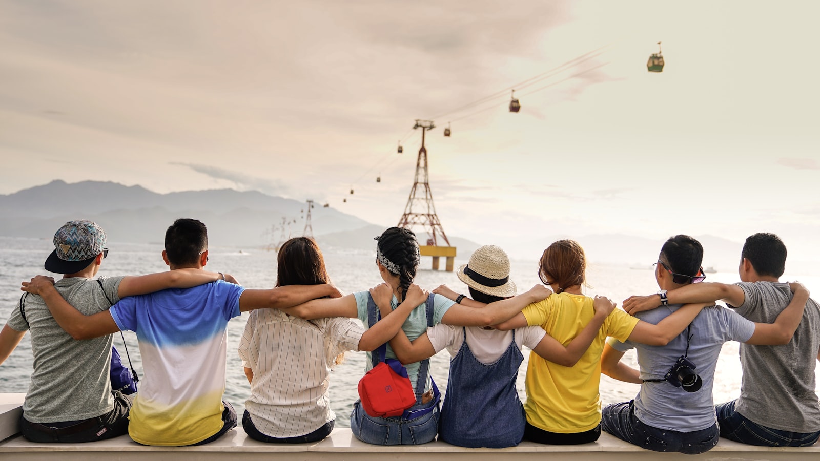 People gathered in intimate conversation — community over crowd